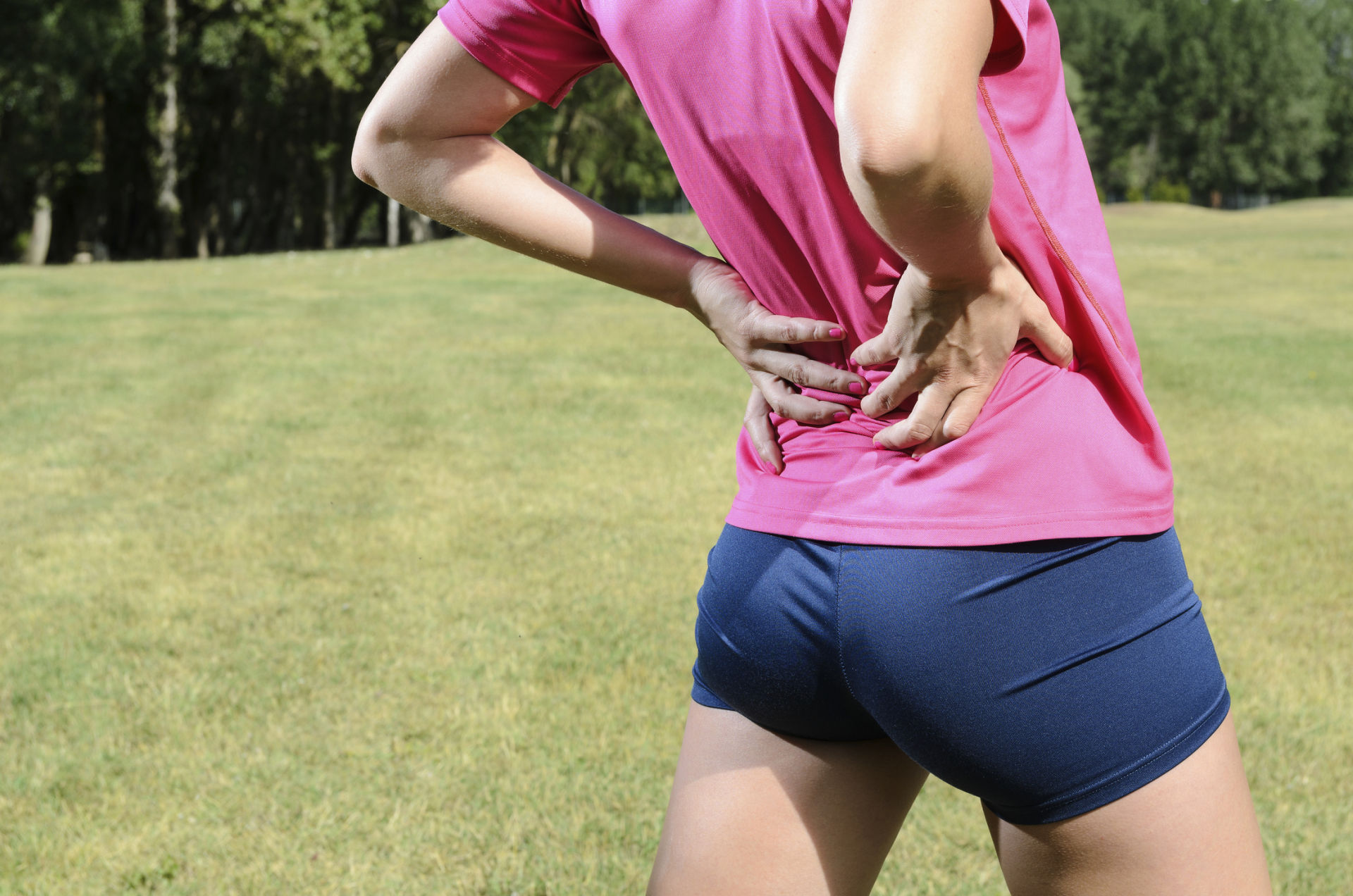 atleta com dor nas costas